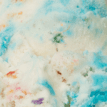 Colorful swirled ice cream texture close-up.