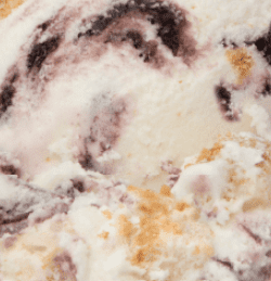 Swirled ice cream with berry and caramel.