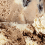 Chocolate and vanilla swirled ice cream close-up.
