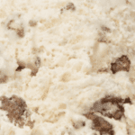 Ice cream with chocolate chunks close-up.