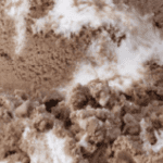 Chocolate and vanilla ice cream close-up.