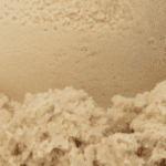 Close-up of creamy beige ice cream.