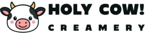 Logo vir "Holy Cow! Creamery" met 'n tekenprentkoeigesig met swart en oranje horings aan die linkerkant en die besigheidsnaam in vetgedrukte swart teks aan die regterkant.