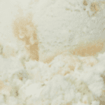 Close-up of creamy vanilla ice cream texture.