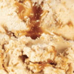 Caramel ice cream texture with sauce drizzle.