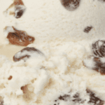 Rum raisin ice cream close-up.